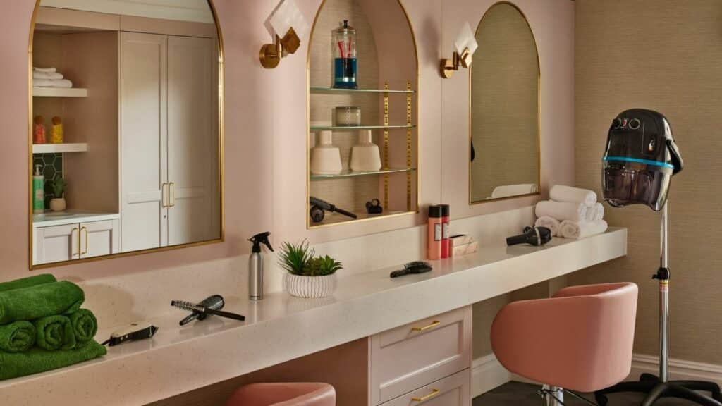 Modern salon with styling tools and mirrors.