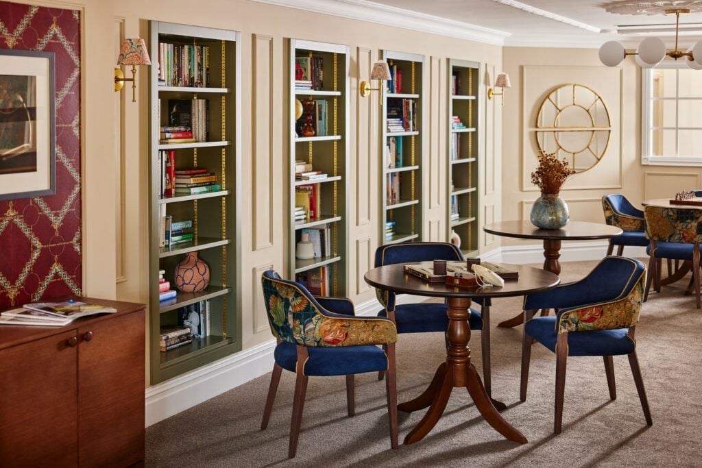 Elegant library with tables and chairs