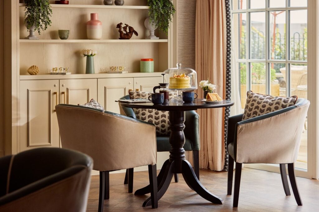 Cosy afternoon tea setup in elegant living room.