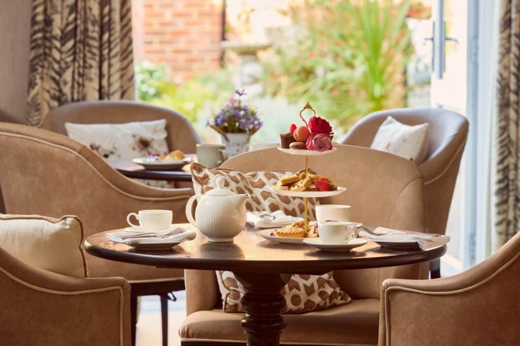 Afternoon tea set in our cosy café area at Banstead Manor Care Home.