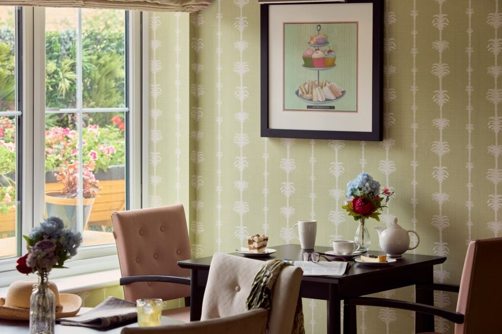 Cosy cafe corner with afternoon tea setting