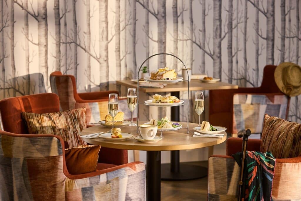 Elegant afternoon tea setup in cosy restaurant.