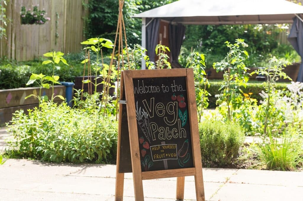 Garden sign welcomes to the Veg Patch area.