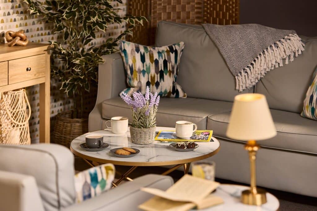 Cosy living room with coffee and soft furnishings