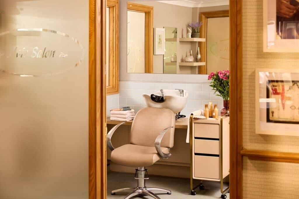 Modern hair salon with chair and wash basin