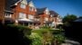 Luxury care home in Billericay, Essex, with garden and patio area.