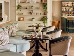 Cozy tea room with elegant decor and seating.