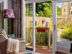 Cosy living room overlooking a sunny garden.