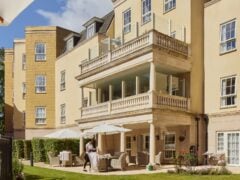 Sunny outdoor seating area of a luxury care home.