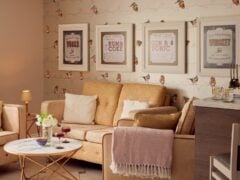 Cosy living room with framed drink posters