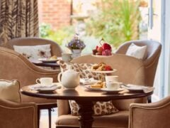 Afternoon tea set in our cosy café area at Banstead Manor Care Home.