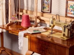 Vintage sewing machine with yarn and patterns on our dementia community.