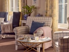 Cosy living room with armchairs and coffee table.