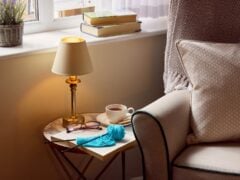Cozy nook with knitting, tea, and books