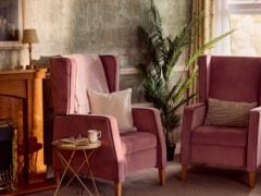 Cosy living room with pink armchairs
