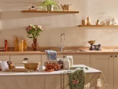 Cosy kitchen with baking ingredients and utensils displayed.