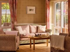 Cosy living room with chess set on table.