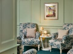 Elegant lounge with armchairs and coffee table.