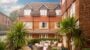 Traditional British townhouse with garden patio area.