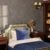 Elegant bedroom with stylish blue and wood furniture.