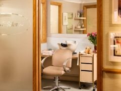 Modern hair salon with chair and wash basin