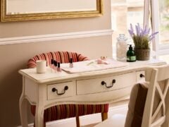 Manicure table with nail polish and skincare products