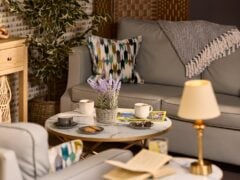 Cosy living room with coffee and soft furnishings