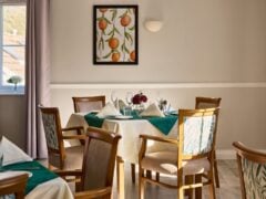 Elegant dining room with neatly set tables