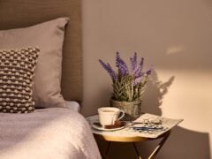 Coffee and lavender on bedside table
